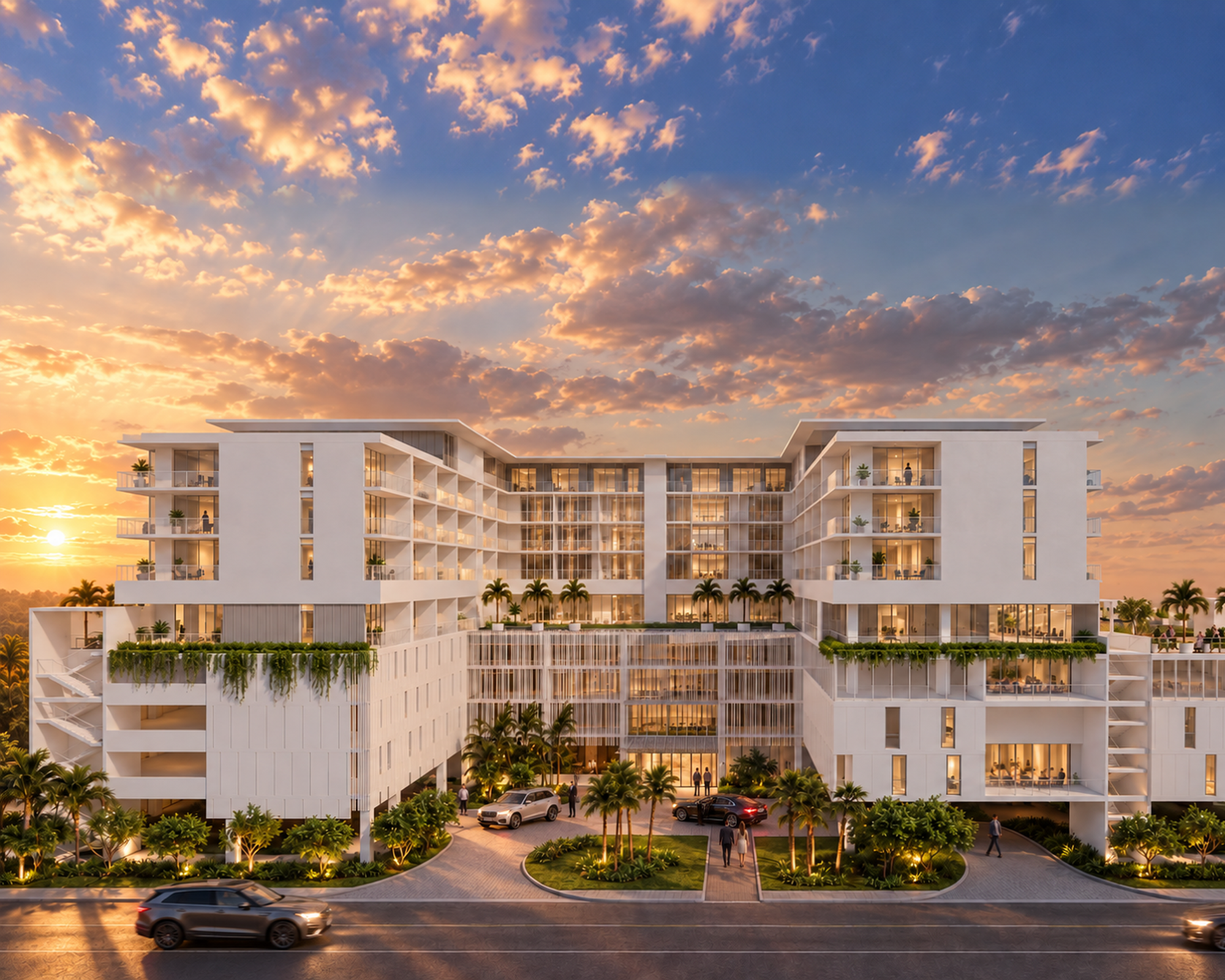 Large white residential complex with balconies, screened lower levels, palms, and a central arrival court.